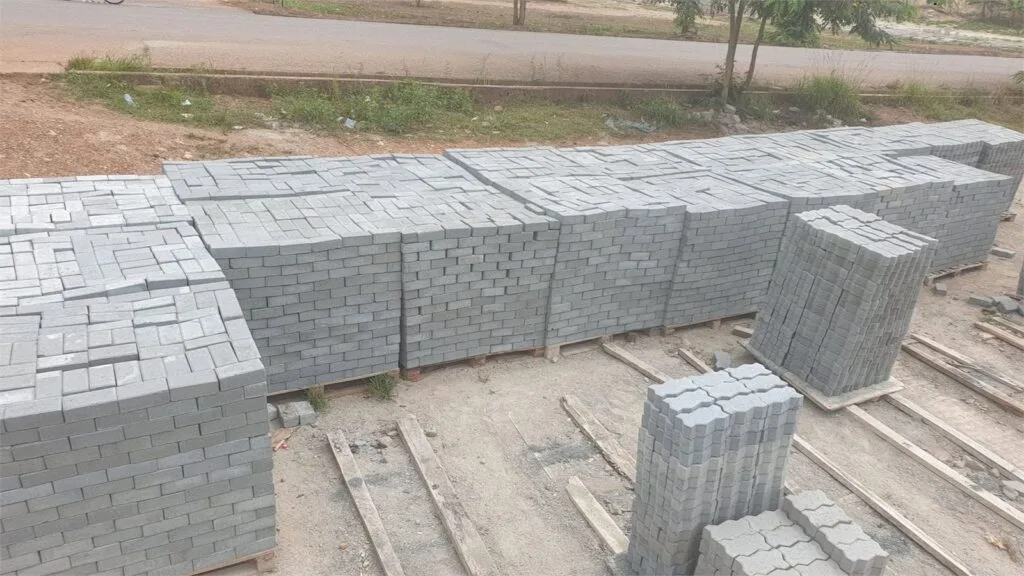 Stacked interlocking pavement blocks on pallets