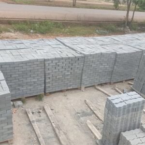 Stacked interlocking pavement blocks on pallets