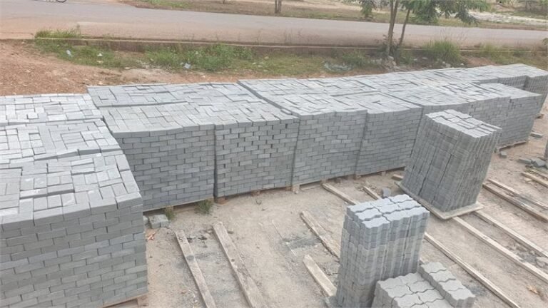 Stacked interlocking pavement blocks on pallets