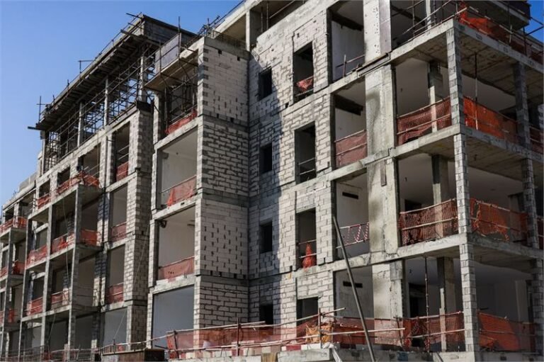 Blockwork walls rising on a multi-storey building