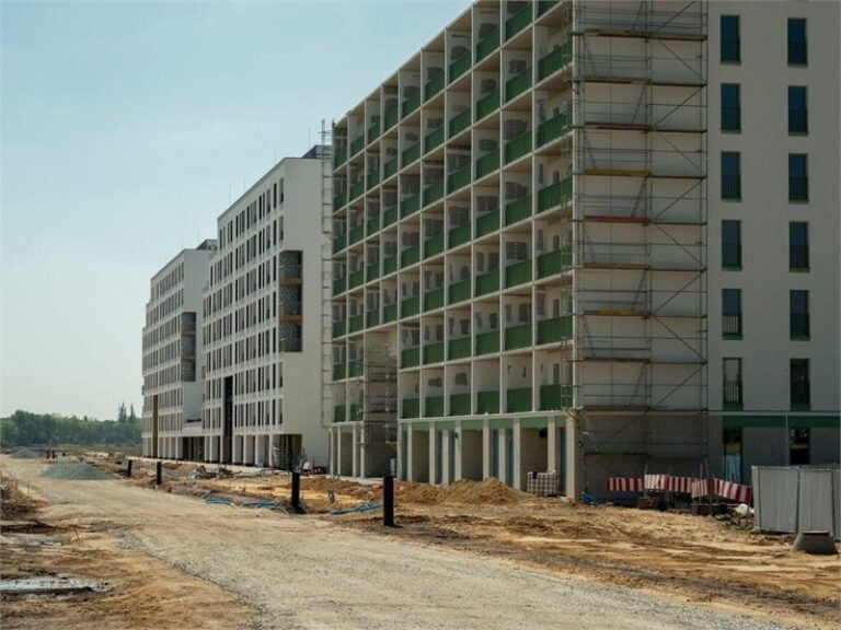Multi-storey development with scaffolding in place