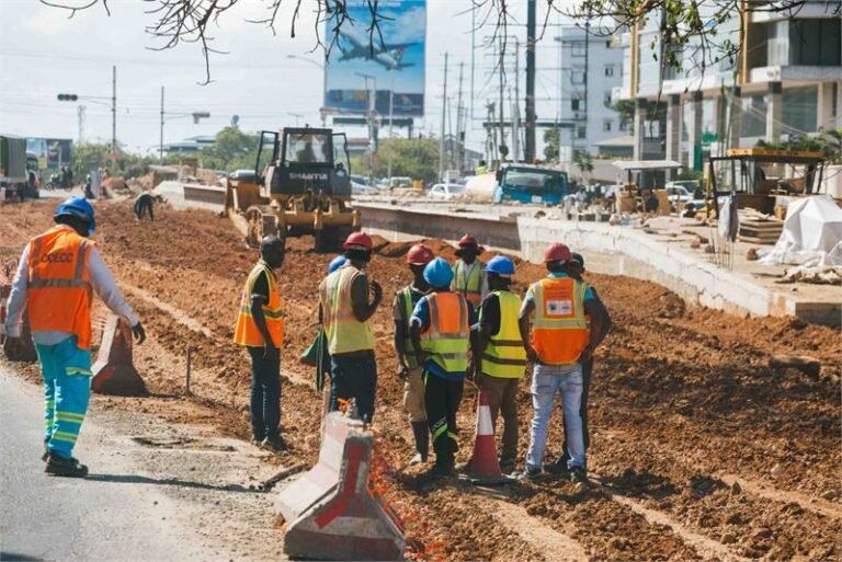 Roadworks team constructing a kerbed public road