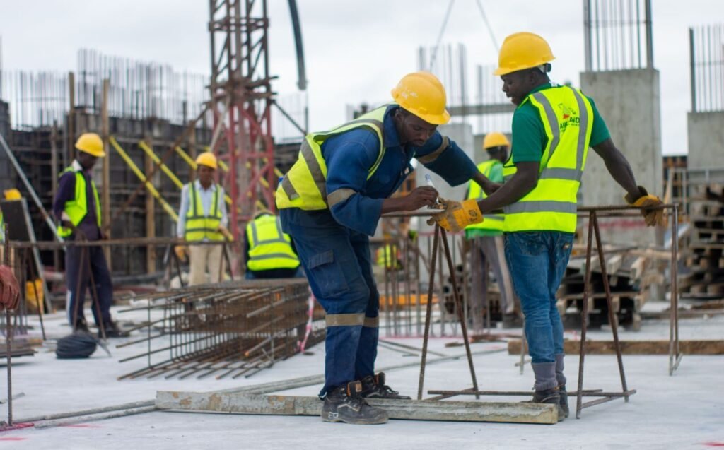 Construction team preparing reinforcement on site