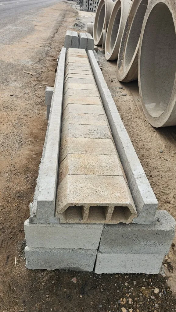 Precast concrete drainage channels and pipes at the production yard
