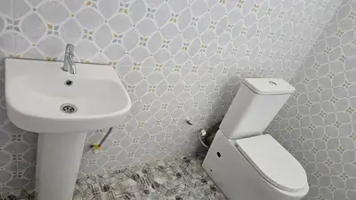 Atweaman SHS Library - tiled washroom