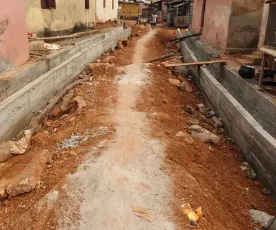 Bonkagyei - concrete drains cast both sides of the street