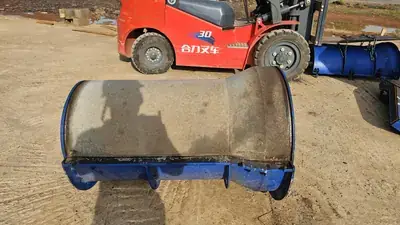 Handling a concrete pipe with the forklift